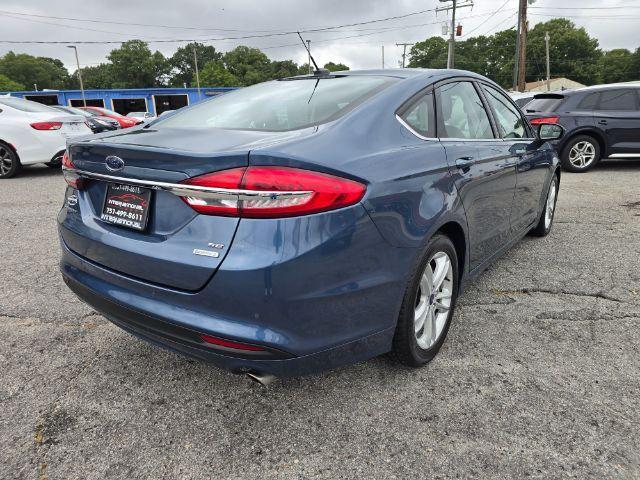 Photo of 2018 Lightning Blue Ford Fusion