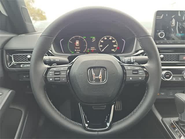 Photo of 2025 Platinum White Pearl Honda Civic Hybrid