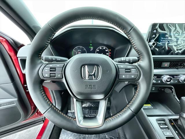 Photo of 2025 Radiant Red Metallic Honda CR-V Hybrid