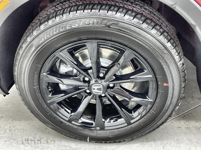 Photo of 2025 Radiant Red Metallic Honda CR-V Hybrid