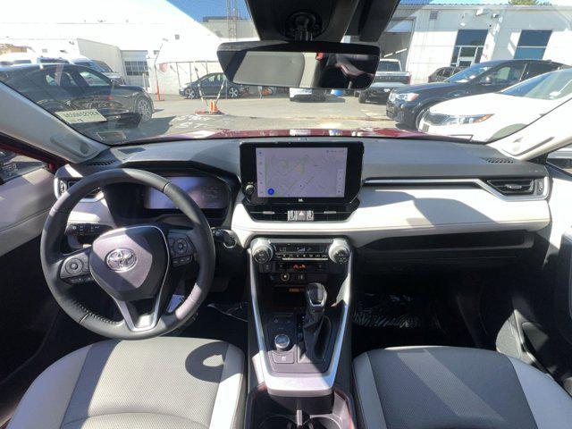 Photo of 2024 Ruby Flare Pearl Toyota RAV4 Hybrid