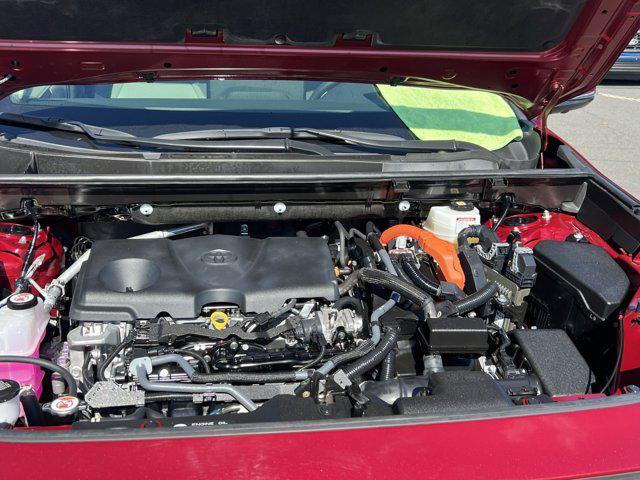 Photo of 2024 Ruby Flare Pearl Toyota RAV4 Hybrid
