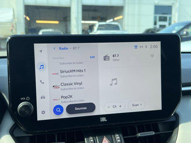 Photo of 2024 Ruby Flare Pearl Toyota RAV4 Hybrid