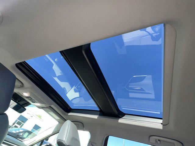 Photo of 2024 Ruby Flare Pearl Toyota RAV4 Hybrid