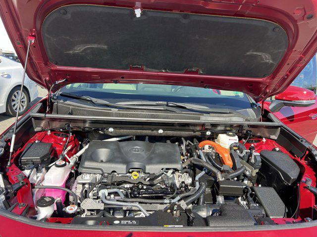 Photo of 2024 Ruby Flare Pearl Toyota RAV4 Hybrid