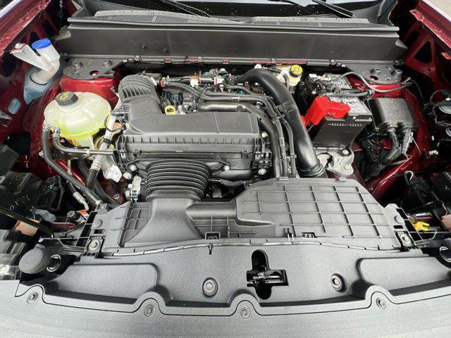 Photo of 2025 RUBY RED METALLIC TINTED CC Ford Maverick