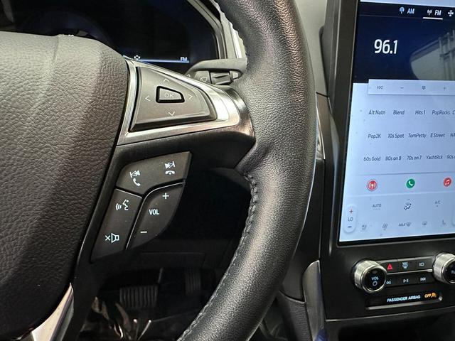 Photo of 2024 Agate Black Metallic Ford Edge