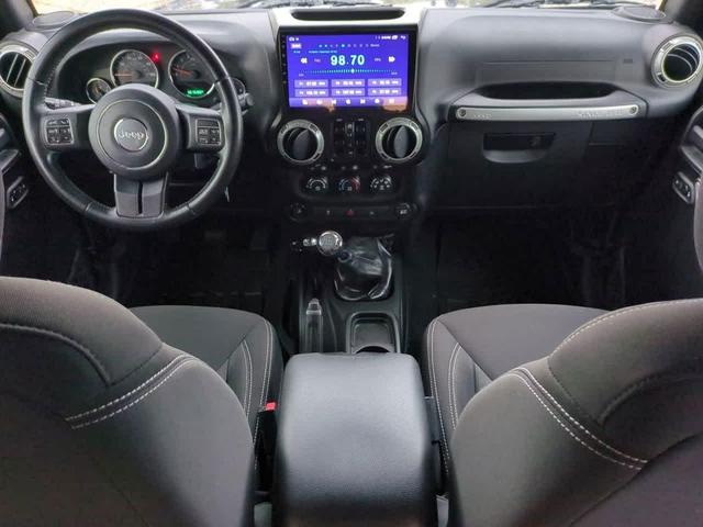 Photo of 2017 Black Clearcoat Jeep Wrangler Unlimited
