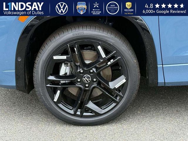 Photo of 2025 Monterey Blue w/Deep Black Roof Volkswagen Tiguan