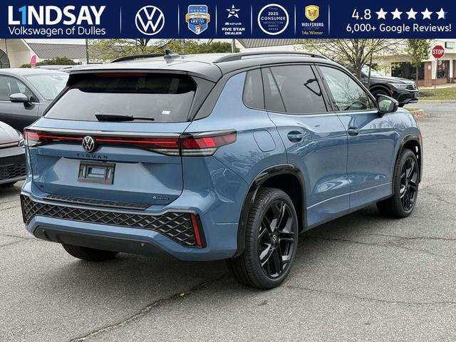 Photo of 2025 Monterey Blue w/Deep Black Roof Volkswagen Tiguan