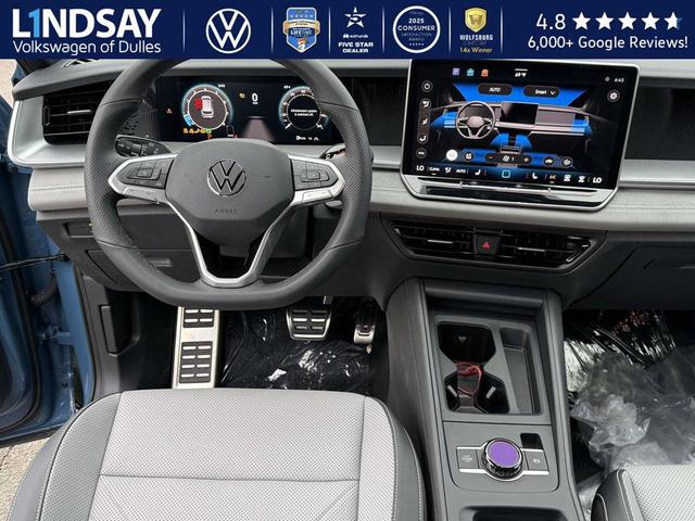 Photo of 2025 Monterey Blue w/Deep Black Roof Volkswagen Tiguan