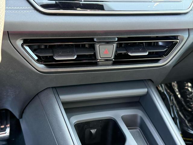 Photo of 2025 Opal White w/Deep Black Roof Volkswagen Tiguan