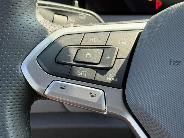 Photo of 2025 Opal White w/Deep Black Roof Volkswagen Tiguan