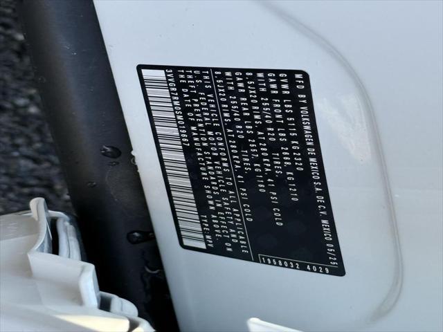 Photo of 2025 Opal White w/Deep Black Roof Volkswagen Tiguan
