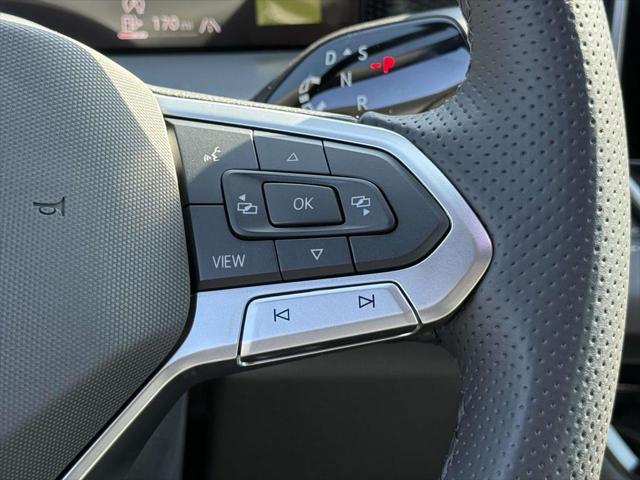 Photo of 2025 Opal White w/Deep Black Roof Volkswagen Tiguan