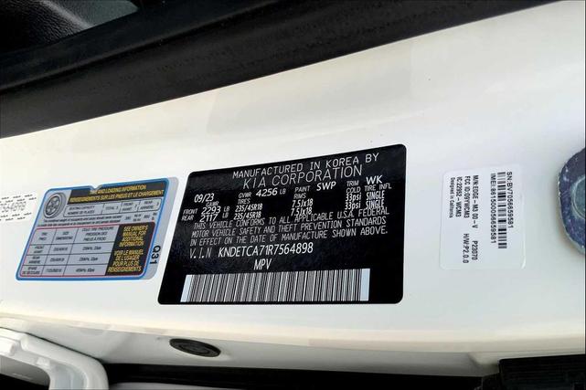 Photo of 2024 Clear White/Black Roof Kia Seltos