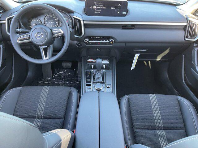 Photo of 2025 Ingot Blue Metallic Mazda CX-50