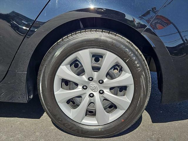 Photo of 2024 Midnight Black Metallic Toyota Corolla