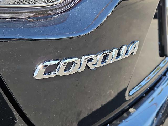 Photo of 2024 Midnight Black Metallic Toyota Corolla