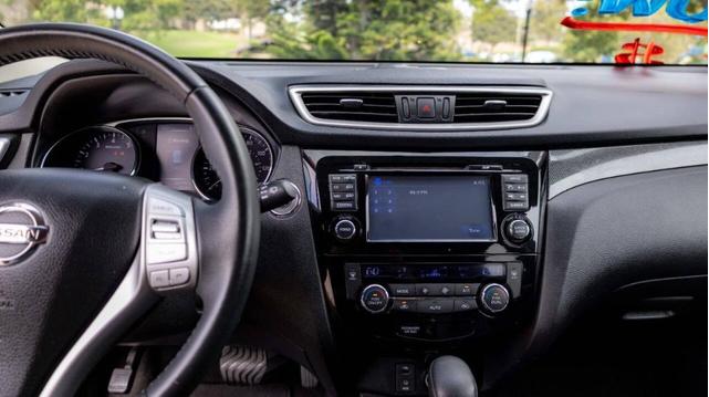 Photo of 2014 Dark Olive Nissan Rogue