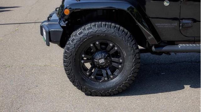 Photo of 2014 Black Clearcoat Jeep Wrangler Unlimited