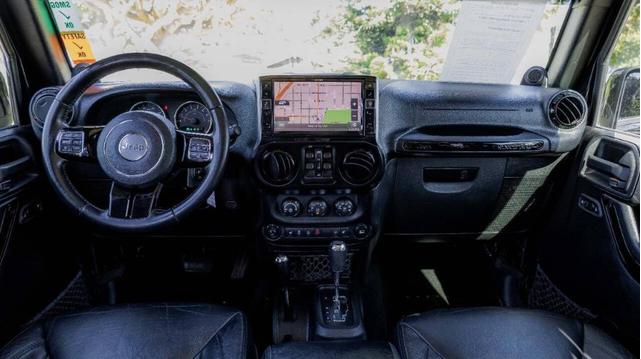 Photo of 2014 Black Clearcoat Jeep Wrangler Unlimited
