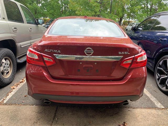 Photo of 2016 Cayenne Red Nissan Altima