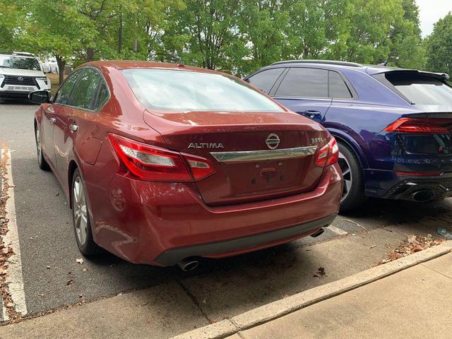 Photo of 2016 Cayenne Red Nissan Altima