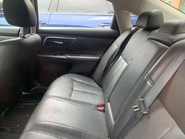 Photo of 2016 Cayenne Red Nissan Altima