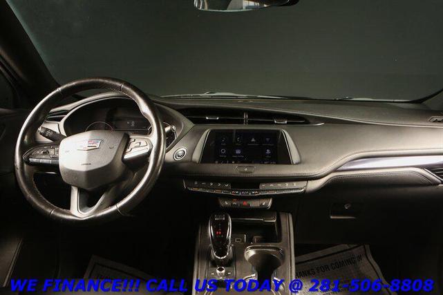Photo of 2023 Stellar Black Metallic Cadillac XT4