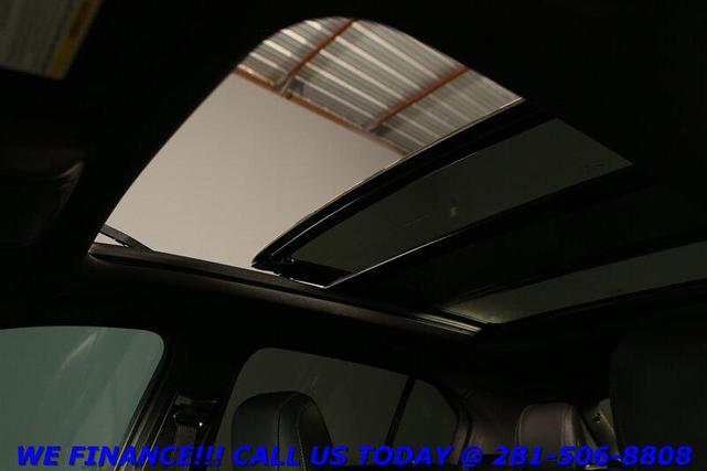 Photo of 2023 Stellar Black Metallic Cadillac XT4