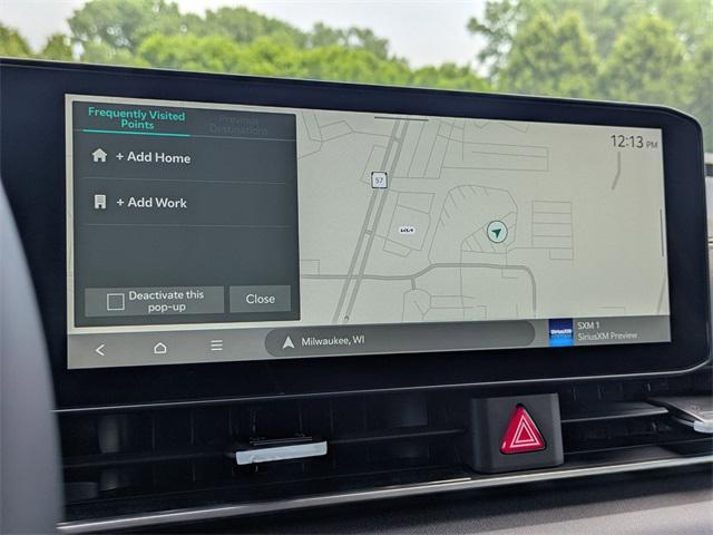 Photo of 2026 Ceramic Silver Kia Carnival Hybrid