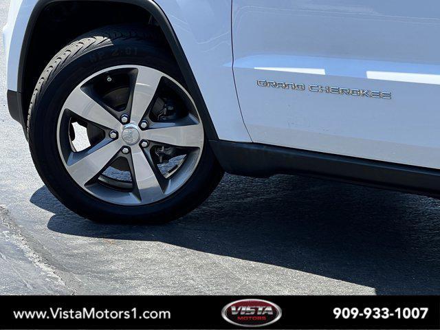 Photo of 2016 Bright White Clearcoat Jeep Grand Cherokee
