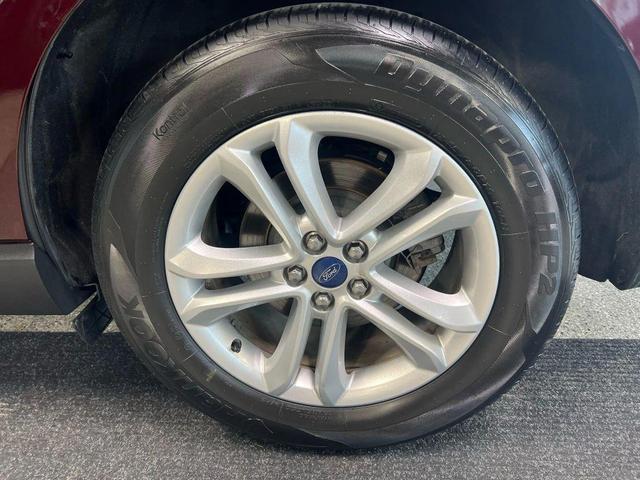 Photo of 2019 Burgundy Ford Edge