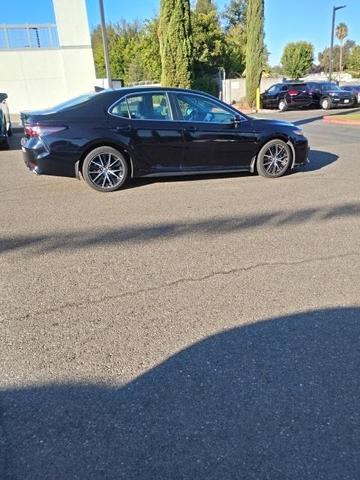 Photo of 2023 Midnight Black Metallic Toyota Camry
