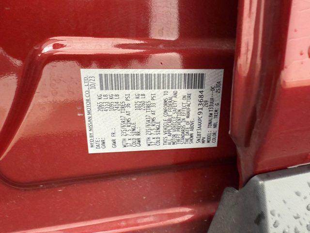 Photo of 2023 Scarlet Ember Tintcoat Nissan Rogue