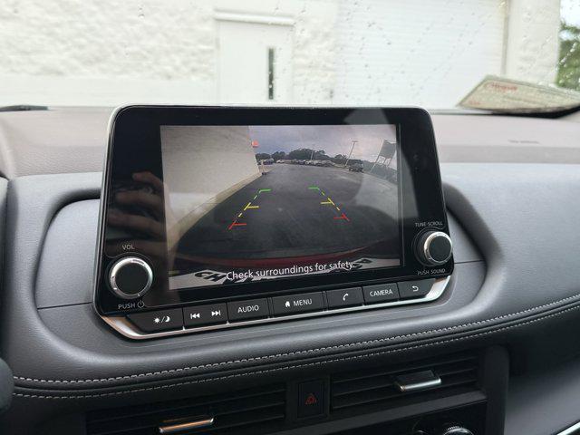 Photo of 2023 Scarlet Ember Tintcoat Nissan Rogue