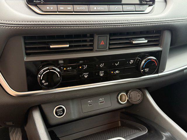 Photo of 2023 Scarlet Ember Tintcoat Nissan Rogue