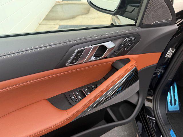 Photo of 2026 Black Sapphire Metallic BMW X6