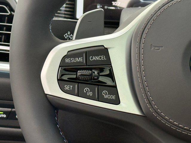 Photo of 2026 Black Sapphire Metallic BMW X6