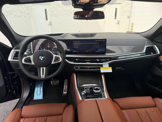 Photo of 2026 Black Sapphire Metallic BMW X6