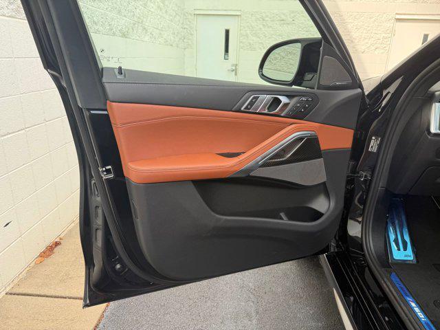 Photo of 2026 Black Sapphire Metallic BMW X6
