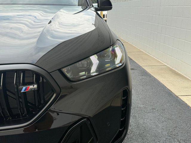 Photo of 2026 Black Sapphire Metallic BMW X6