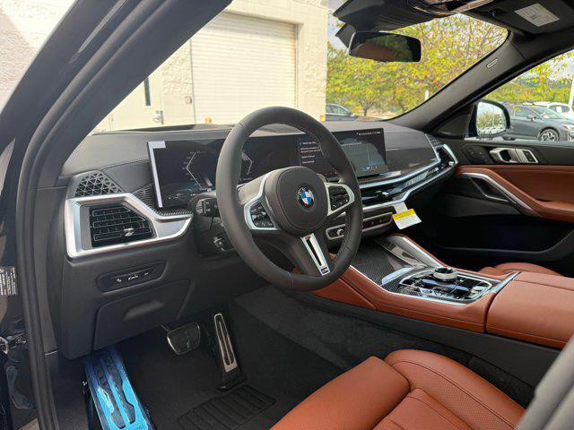 Photo of 2026 Black Sapphire Metallic BMW X6