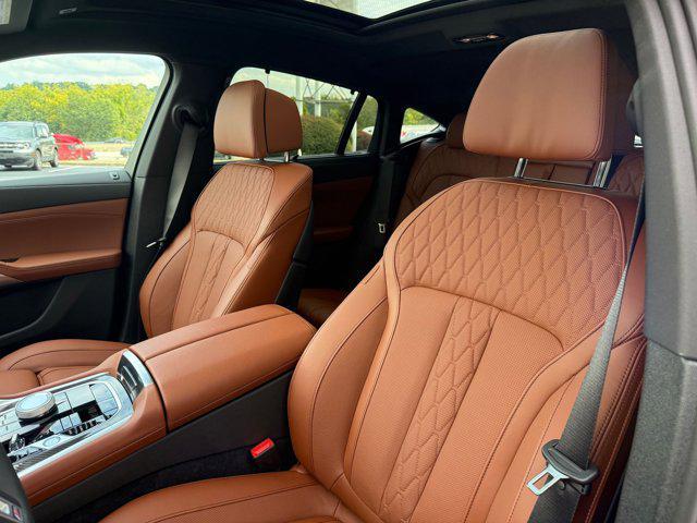 Photo of 2026 Black Sapphire Metallic BMW X6