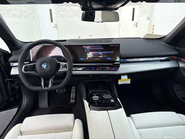 Photo of 2026 Black Sapphire Metallic BMW i5