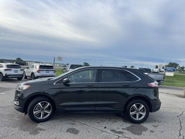 Photo of 2023 FORGED GREEN Ford Edge
