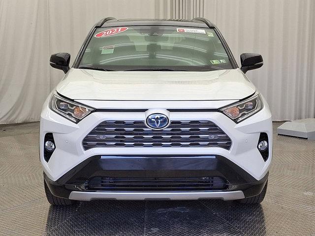 Photo of 2021 Blizzard Pearl/Midnight Black Metallic - 2QJ Toyota RAV4 Hybrid