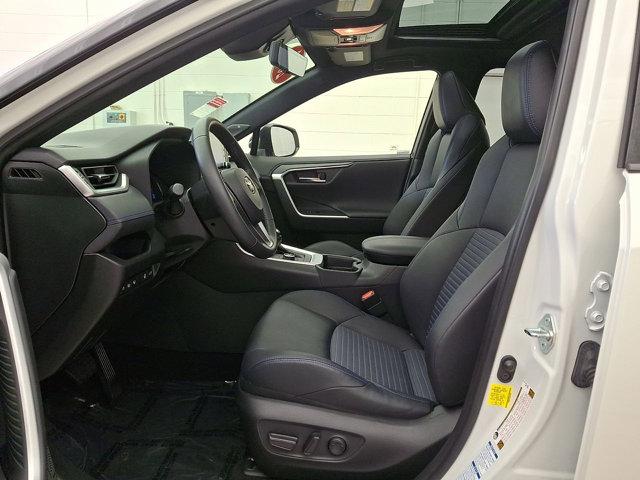 Photo of 2021 Blizzard Pearl/Midnight Black Metallic - 2QJ Toyota RAV4 Hybrid