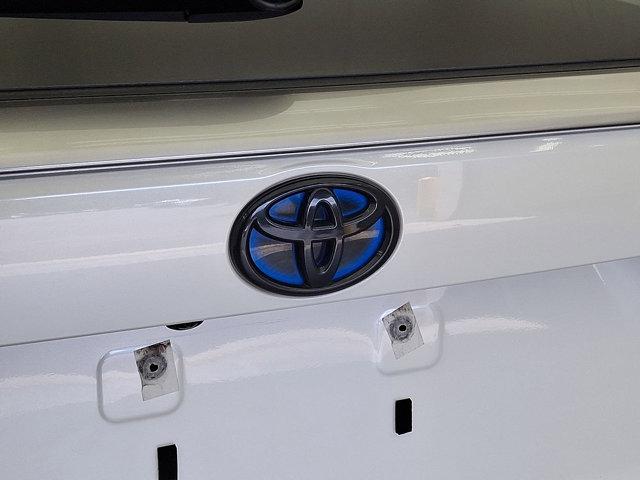 Photo of 2021 Blizzard Pearl/Midnight Black Metallic - 2QJ Toyota RAV4 Hybrid